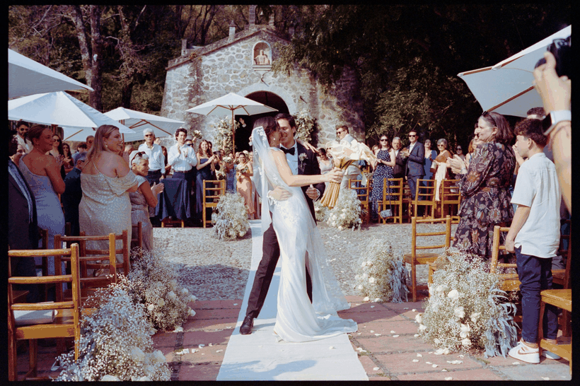 Pablo and Kiara's first kiss as they leave the ceremony, on film